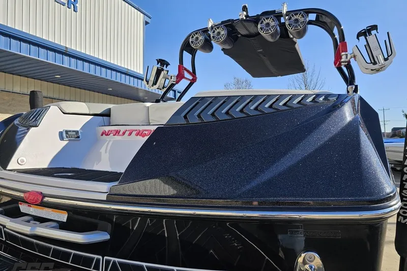 Slide: The Image of 2015 Nautique Super Air Nautique G23 boat with sleek design and advanced features. - 42