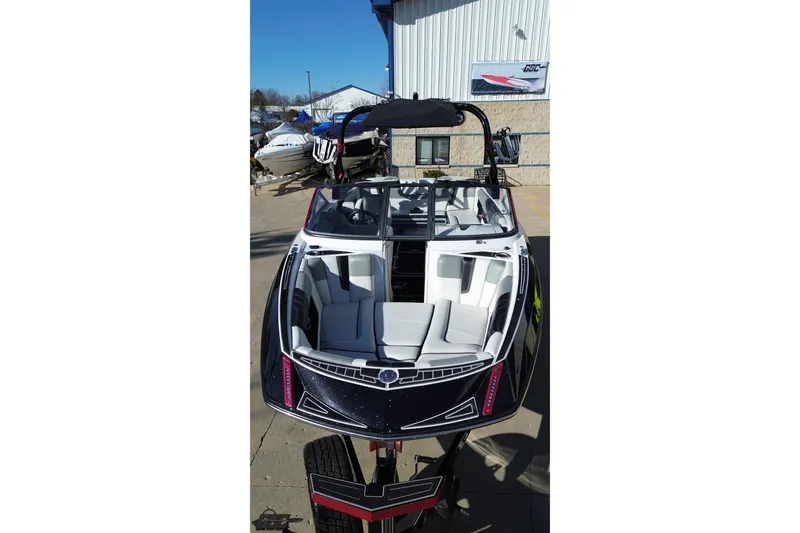Slide: The Image of 2015 Nautique Super Air Nautique G23 boat with sleek design and spacious seating. - 43