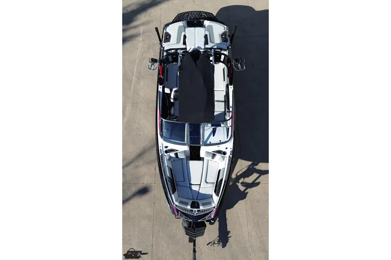 Slide: The Image of Overhead view of 2015 Nautique Super Air Nautique G23 boat, showcasing sleek design and seating layout. - 46
