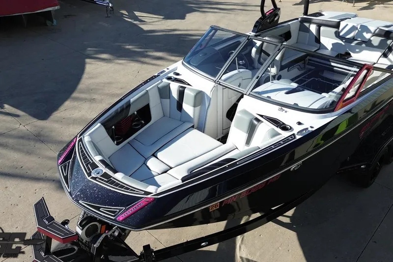 Slide: The Image of 2015 Nautique Super Air Nautique G23 boat with sleek design and spacious seating. - 47
