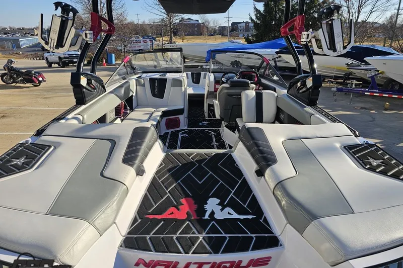 Slide: The Image of 2015 Nautique Super Air Nautique G23 interior with sleek seating and modern design. - 60