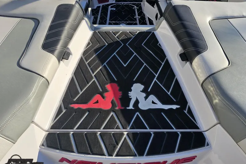 Slide: The Image of 2015 Nautique Super Air Nautique G23 boat interior with custom seat design. - 61