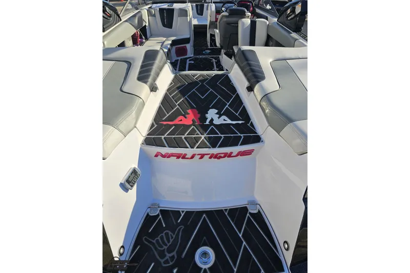 Slide: The Image of 2015 Nautique Super Air Nautique G23 interior with custom seating and logo detailing. - 62
