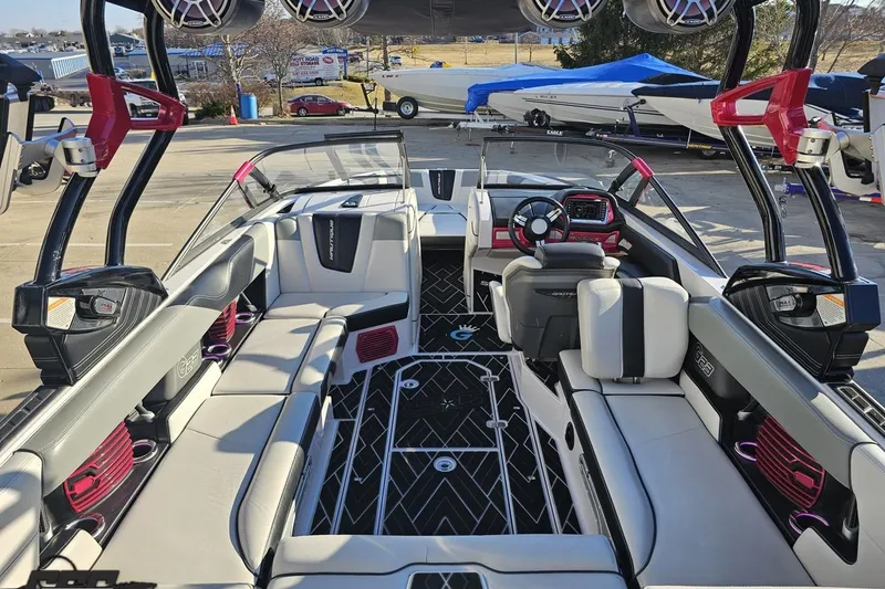 Slide: The Image of 2015 Nautique Super Air Nautique G23 interior with luxury seating and advanced dashboard. - 65