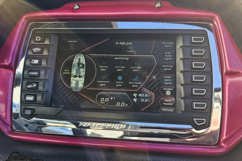 Slide: The Image of Touchscreen control panel of a 2015 Nautique Super Air Nautique G23 boat. - 93