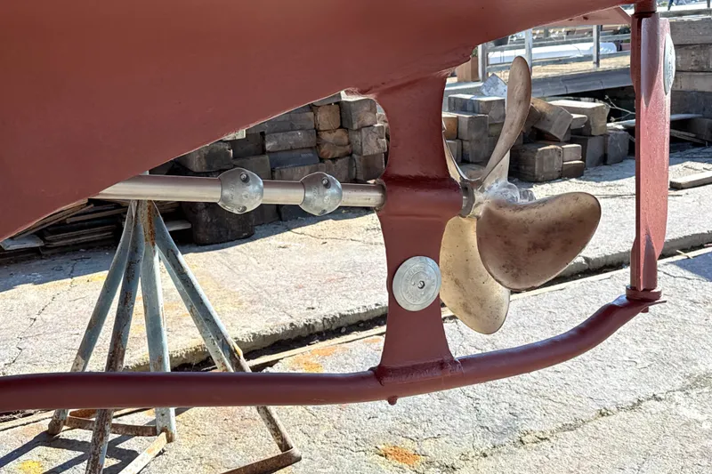 Slide: The Image of Propeller and shaft of a 1974 Dyer 29' Sport Fisher boat on dry dock. - 18