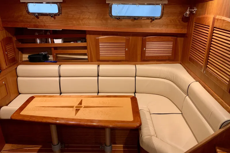 Slide: The Image of Luxurious interior of 2006 Sabre 38 Hard Top Express with elegant wood and leather seating. - 11
