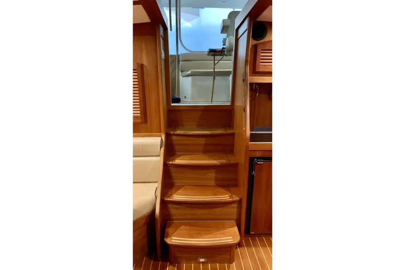 Slide: The Image of Wooden interior stairs of 2006 Sabre 38 Hard Top Express yacht. - 25