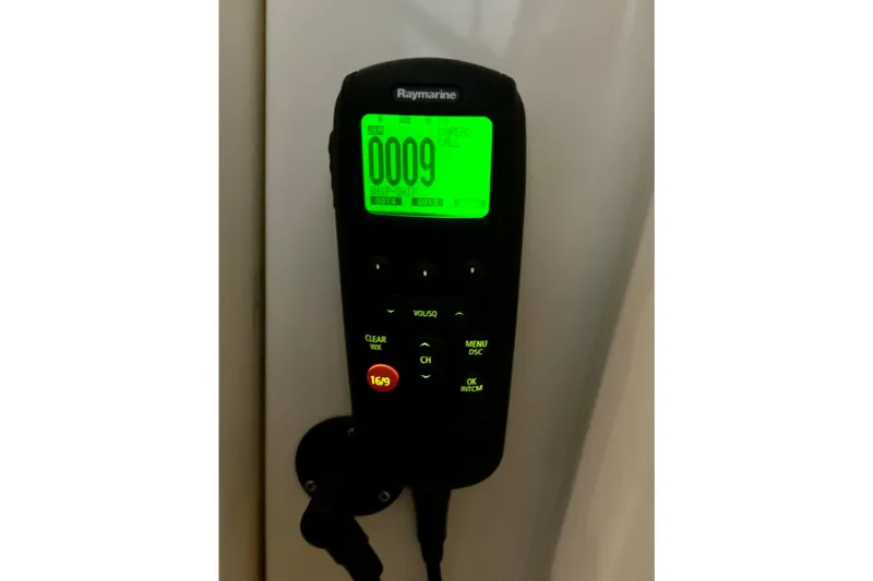 Slide: The Image of Raymarine marine radio on 2006 Sabre 38 Hard Top Express boat, illuminated display. - 32