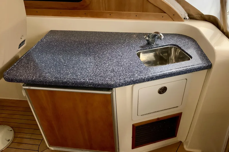 Slide: The Image of 2006 Sabre 38 Hard Top Express yacht interior with compact sink and countertop. - 35