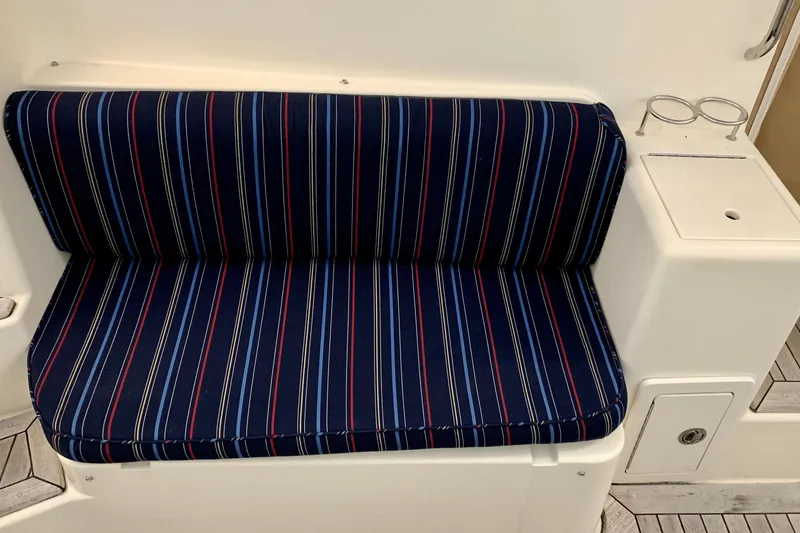 Slide: The Image of Striped seat cushion on 2006 Sabre 38 Hard Top Express boat. - 42