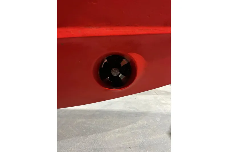 Slide: The Image of Red hull detail of 2006 Sabre 38 Hard Top Express boat. - 58