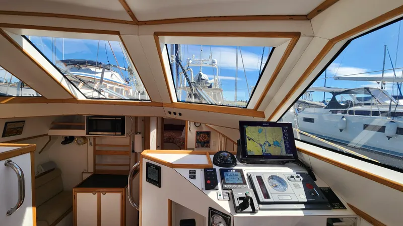 Slide: The Image of Interior view of 2004 Dudley Dix Jacobs Bros 43 Pilot yacht cockpit with navigation equipment. - 27