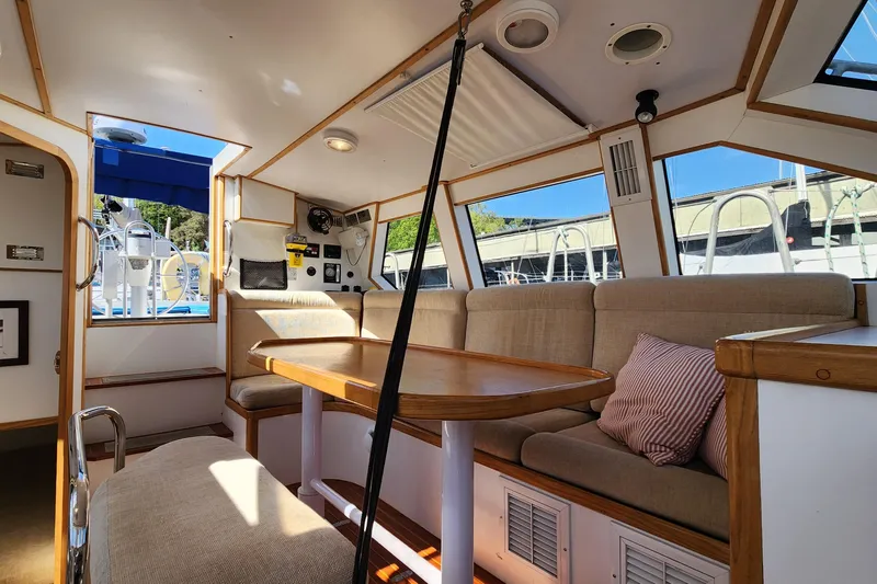 Slide: The Image of Interior of 2004 Dudley Dix Jacobs Bros 43 Pilot boat with seating and table. - 38