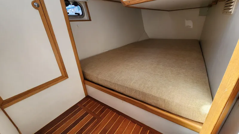 Slide: The Image of Cozy cabin interior of 2004 Dudley Dix Jacobs Bros 43 Pilot sailboat. - 24