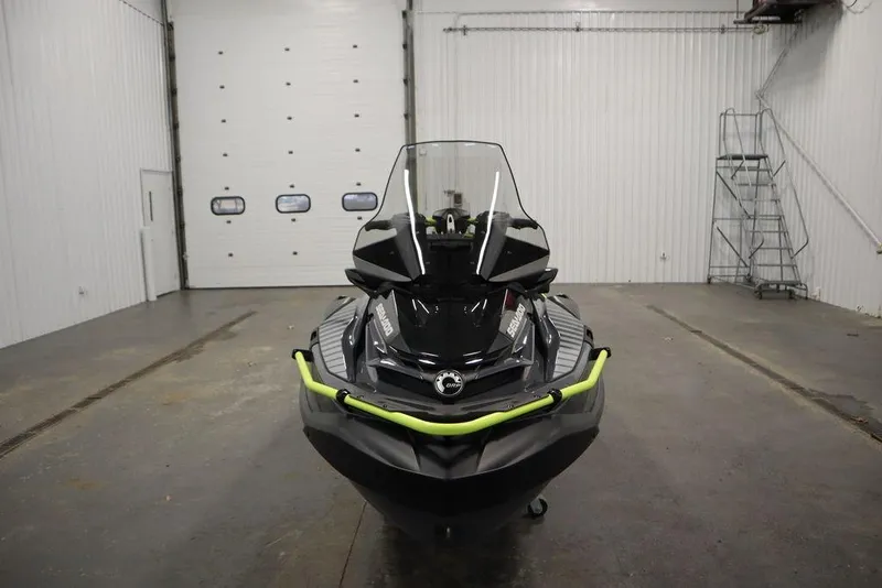Slide: The Image of 2026 Sea-Doo Explorer Pro 170 jet ski in a garage setting. - 3