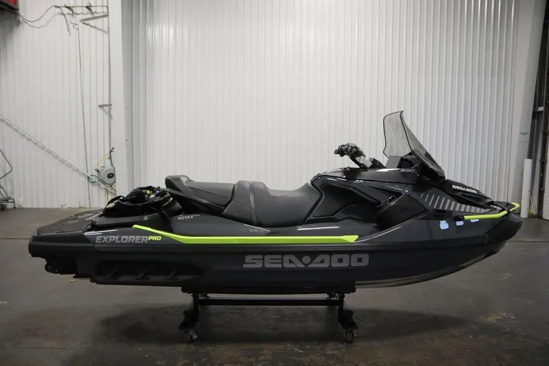 Slide: The Image of 2026 Sea-Doo Explorer Pro 170 jet ski in a showroom setting. - 4