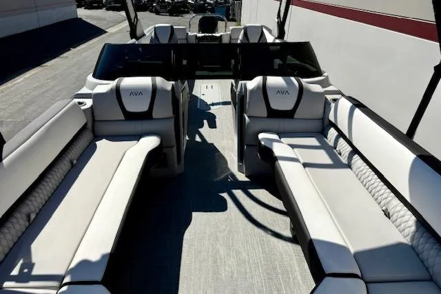 Slide: The Image of 2026 Avalon Catalina Quad Lounge 27' interior with luxurious seating and modern design. - 12