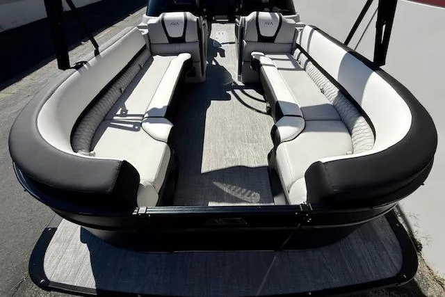 Slide: The Image of 2026 Avalon Catalina Quad Lounge 27' pontoon boat with spacious seating and modern design. - 13
