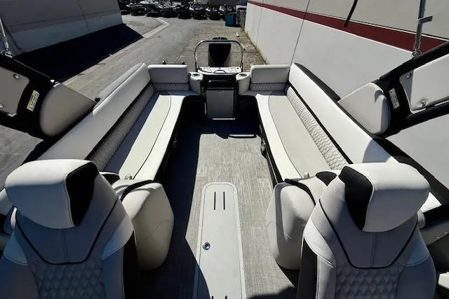 Slide: The Image of 2026 Avalon Catalina Quad Lounge 27' interior with luxurious seating and modern design. - 5