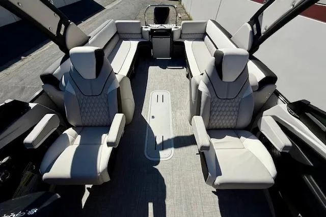 Slide: The Image of 2026 Avalon Catalina Quad Lounge 27' interior with luxurious seating and modern design. - 6