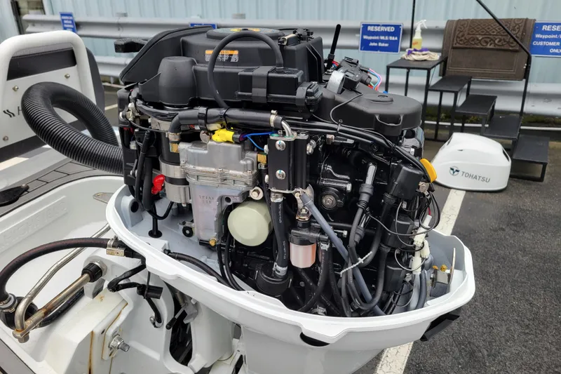 Slide: The Image of 2023 Highfield Sport 330 boat engine, detailed view of mechanical components. - 13