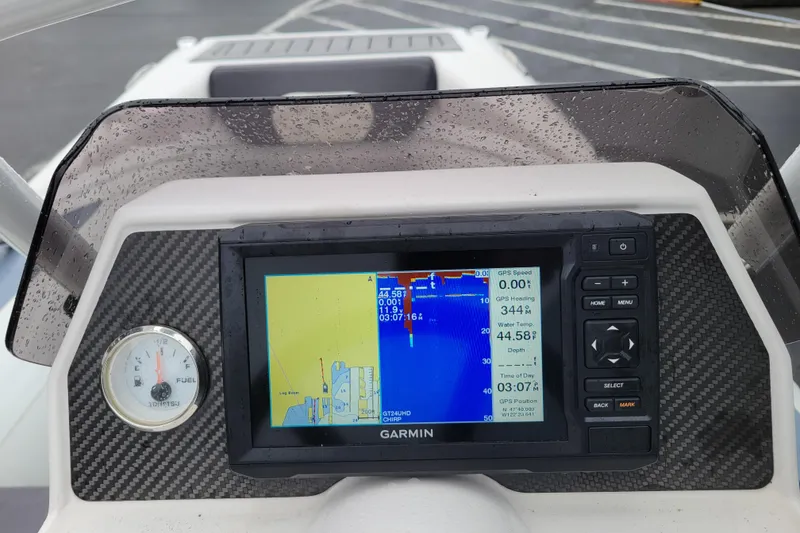 Slide: The Image of Dashboard of 2023 Highfield Sport 330 with Garmin GPS and fuel gauge. - 8