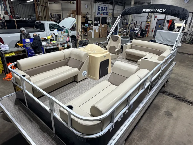 The Image of Northstar 2200 Cruise Pontoon 2023 indoors, beige seating, $19995. - 1