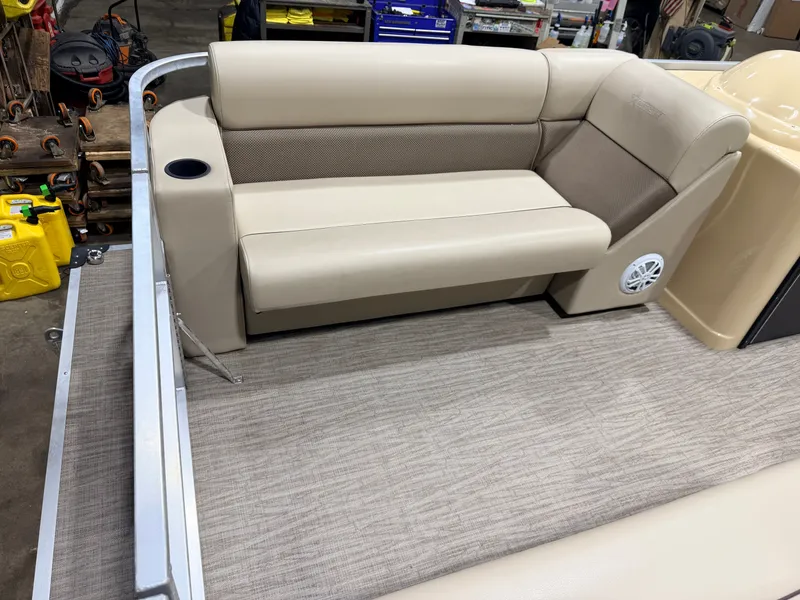 Slide: The Image of Interior of 2023 Northstar 2200 Cruise Pontoon with beige seating area. - 15