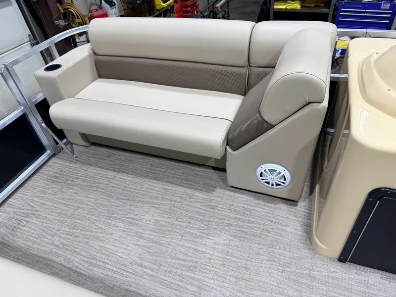 Slide: The Image of Interior of Northstar 2200 Cruise Pontoon 2023 with beige sofa. - 16