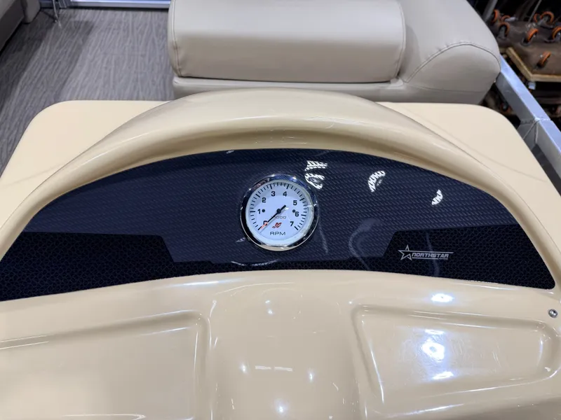 Slide: The Image of Dashboard of Northstar 2200 Cruise Pontoon 2023 with RPM gauge. - 24