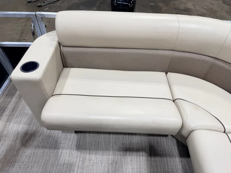 Slide: The Image of 2023 Northstar 2200 Cruise Pontoon seating area with cup holder. - 31