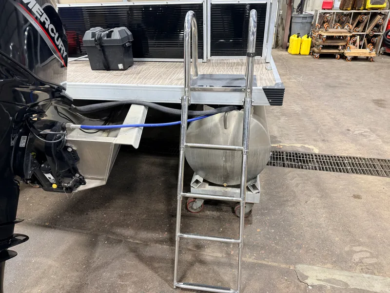 Slide: The Image of Northstar 2200 Cruise Pontoon with ladder and motor, year 2023. - 33