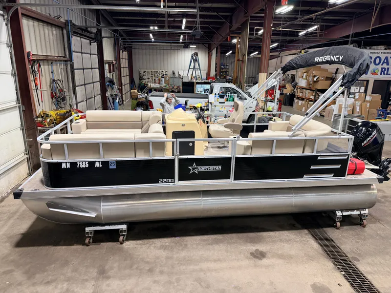 Slide: The Image of 2023 Northstar 2200 Cruise Pontoon in warehouse, priced at $19995. - 4