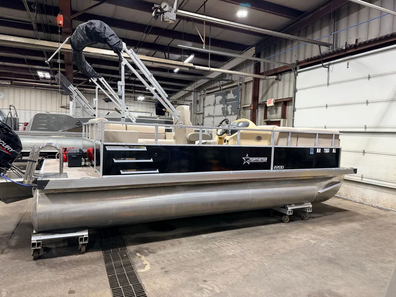 Slide: The Image of 2023 Northstar 2200 Cruise Pontoon indoors, priced at $19995. - 44