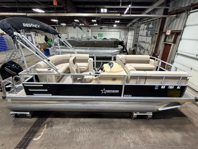 Slide: The Image of 2023 Northstar 2200 Cruise Pontoon indoors, priced at $19995. - 47