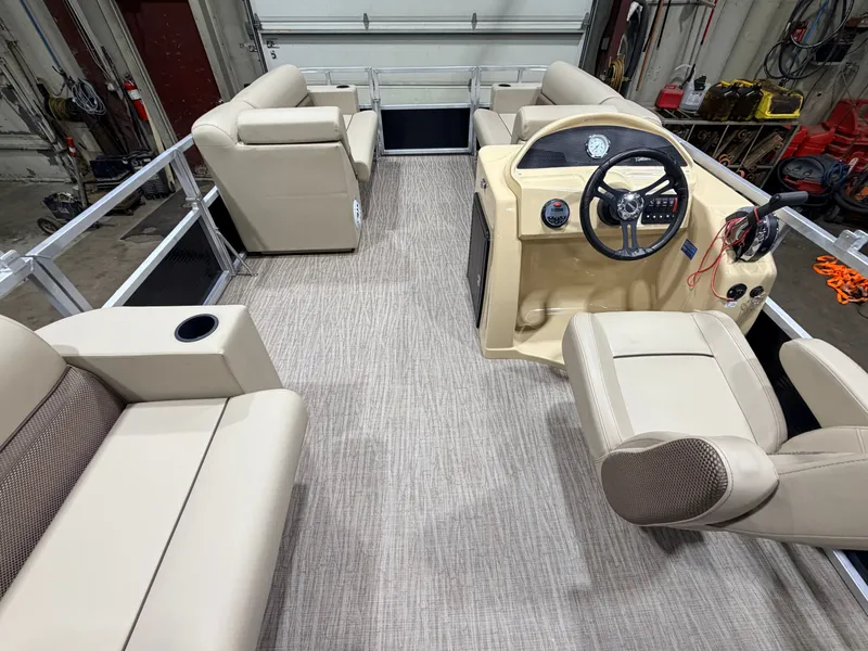 Slide: The Image of Interior of 2023 Northstar 2200 Cruise Pontoon with beige seating. - 6