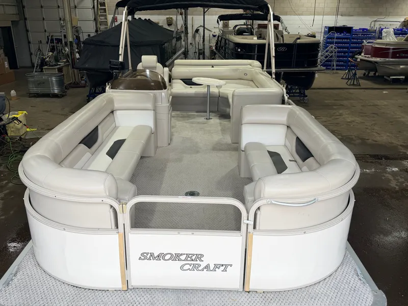 Slide: The Image of 2006 Smoker Craft pontoon boat with Yamaha 60HP 4-stroke engine, interior view. - 10