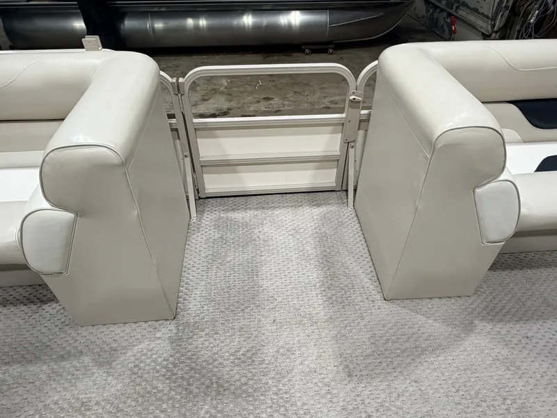 Slide: The Image of Interior view of a 2006 Smoker Craft 8522 pontoon boat. - 13