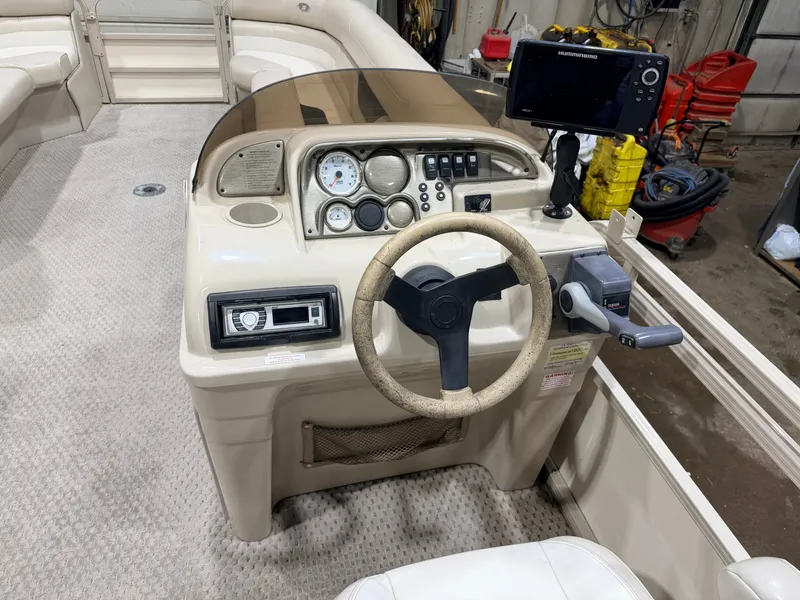Slide: The Image of Interior view of a 2006 Smoker Craft 8522 Cruise Pontoon boat. - 22