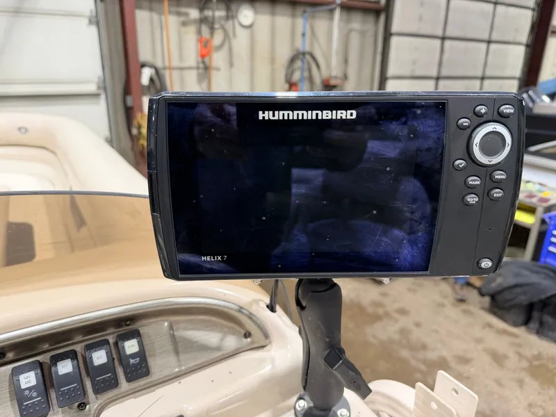 Slide: The Image of Humminbird Helix 7 on Smoker Craft pontoon boat, 2006 model. - 24