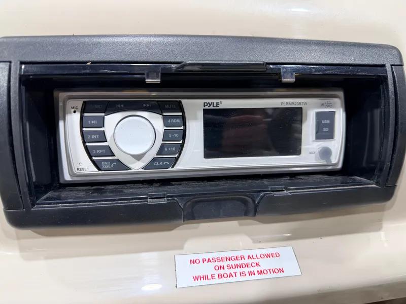 Slide: The Image of Pyle marine stereo on 2006 Smoker Craft pontoon boat, model 8522. - 25