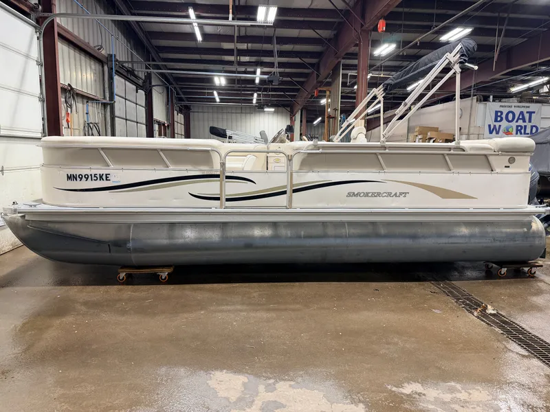 Slide: The Image of 2006 Smoker Craft 8522 pontoon with Yamaha 60HP, in warehouse. - 26
