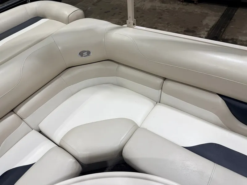 Slide: The Image of Interior of 2006 Smoker Craft 8522 pontoon boat, cream upholstery. - 31