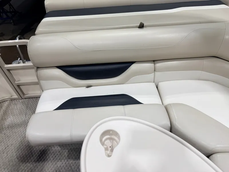 Slide: The Image of Interior of 2006 Smoker Craft 8522 pontoon boat with beige seating. - 32