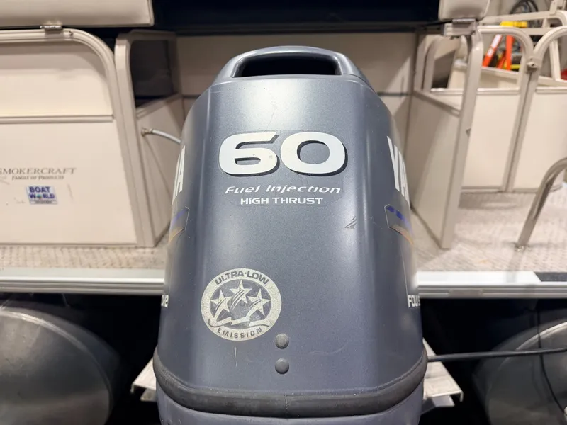 Slide: The Image of Yamaha 60HP outboard motor on 2006 Smoker Craft pontoon boat. - 49