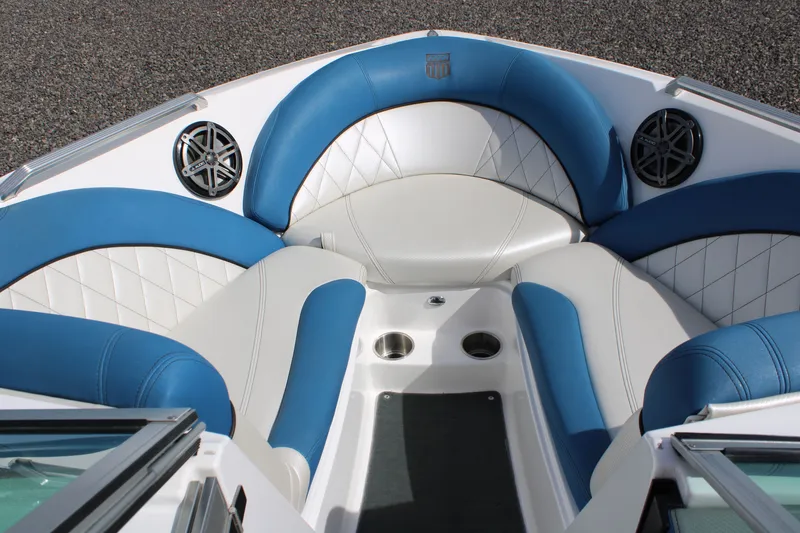 Slide: The Image of Interior of MasterCraft X10 boat, blue and white upholstery, speakers, 2013 model. - 16