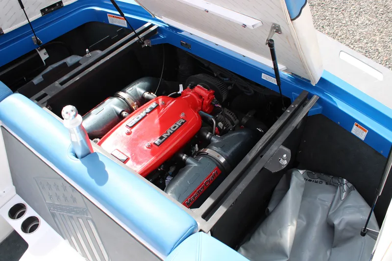 Slide: The Image of 2013 MasterCraft X10 boat engine with red Ilmor logo. - 9