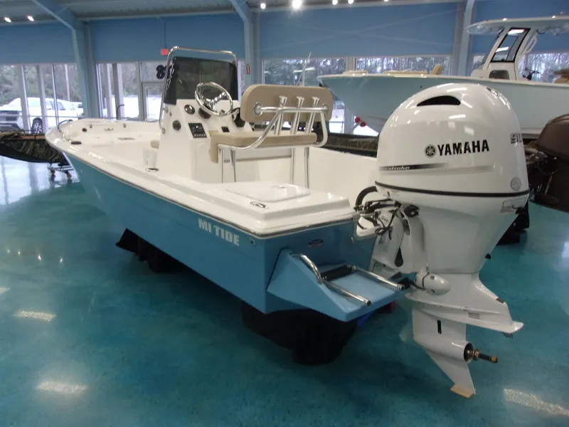 Slide: The Image of Mi Tide v1700 CC 2026 boat with Yamaha engine in showroom. - 5