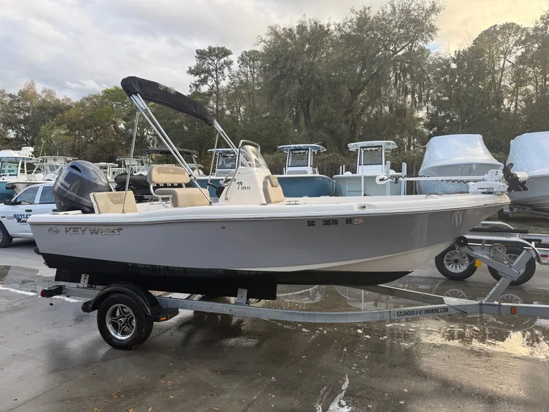 The Image of 2024 Key West 179 FS boat on trailer outdoors. - 1